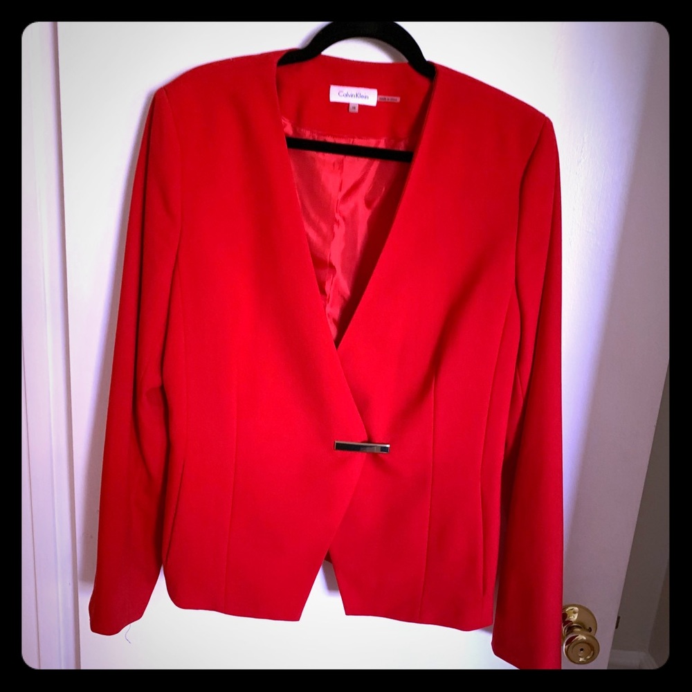 Red power jacket with synced waist.